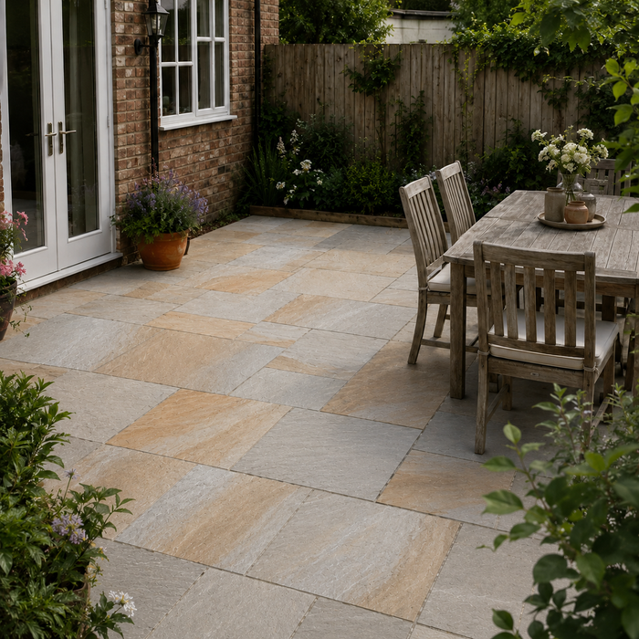 Kandla Grey Indian sandstone paving installed in a traditional English rear garden with mixed grey and warm natural tones.
