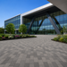 Marshalls Atlas concrete block paving installed in a modern commercial landscaping project outside an office building.