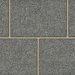 Marshalls Atlas Dark Grey concrete block paving with a textured granite-inspired finish.