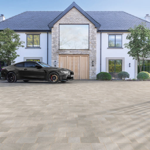 Marshalls Carto Grey Multi block paving installed across a large driveway in front of a modern house. 
