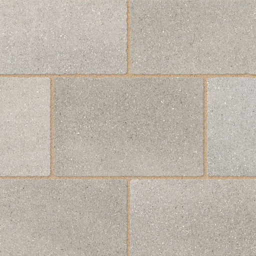 Close-up of Marshalls Carto Grey Multi concrete block paving showing the varied light and mid-grey tones.