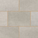 Close-up of Marshalls Carto Grey Multi concrete block paving showing the varied light and mid-grey tones.