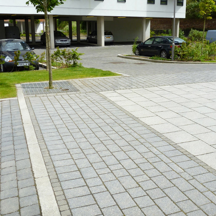 Marshalls Conservation X Block paving installed in Silver Grey on a commercial landscaping scheme