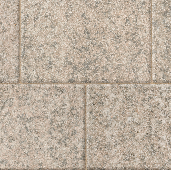 Close-up of a stone pavement with square tiles.