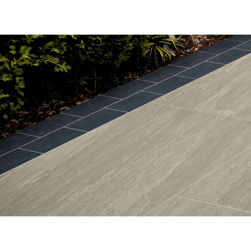 Marshalls Vedastone Anthracite porcelain setts used as patio edging