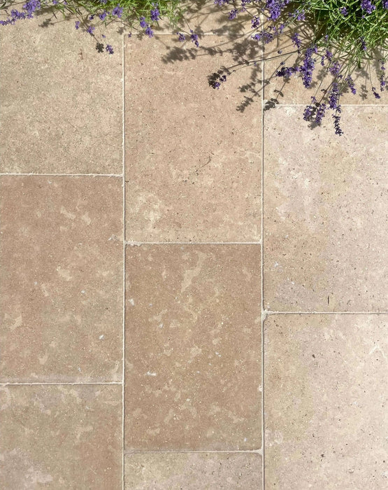 Paveworld Acid Wash Sinai Pearl limestone close-up showing textured tumbled finish