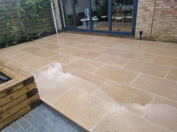 Paveworld Acid Wash Sinai Pearl tumbled limestone paving in warm beige natural tones