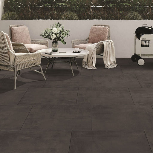 Paveworld Cemento Nero genuine manufacturer product image showing the exact vitrified porcelain paving