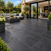Paveworld Cemento Nero vitrified porcelain paving 900 x 600mm installed patio