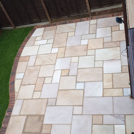 Paveworld Chivas Caramel Buff sandstone paving installed patio