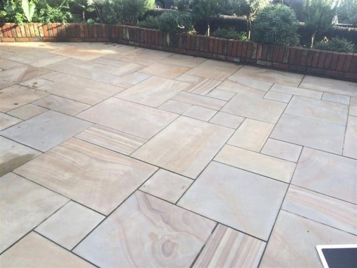 Paveworld Chivas Caramel Buff sandstone showing natural veining and colour banding