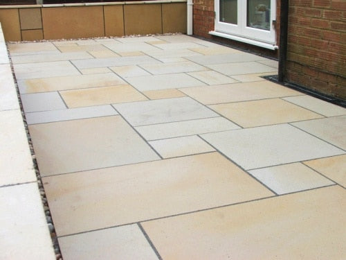 Paveworld Chivas Mint Goose sandstone slabs showing warm buff colour and honed finish