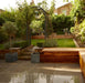 Paveworld Chivas Santa Fee smooth sandstone patio with warm buff and olive tones