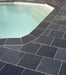 Paveworld Elite Black Lime limestone paving around swimming pool
