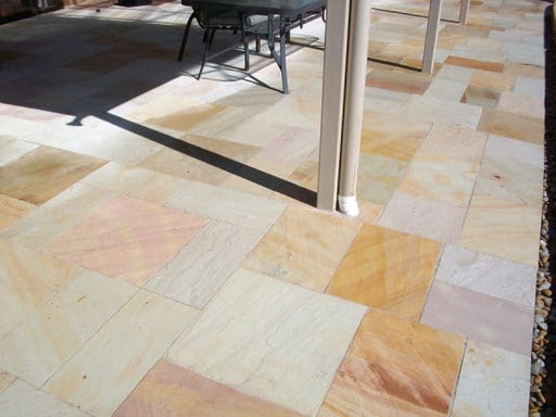 Paveworld Elite Mint Fossil sandstone slabs showing warm cream and fossil tones