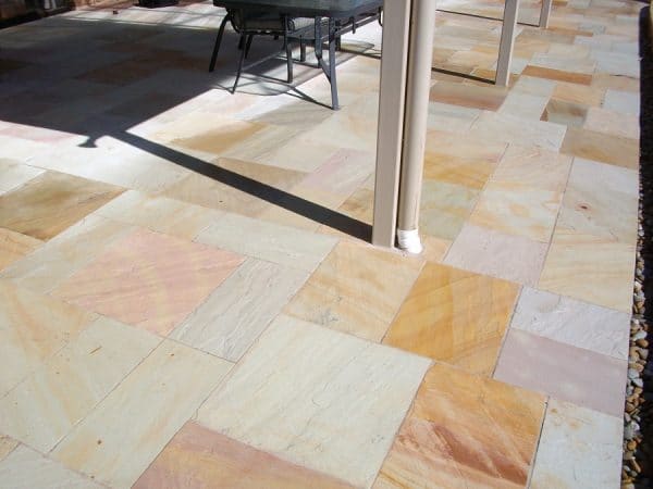 Paveworld Elite Mint Fossil sandstone slabs showing warm cream and fossil tones