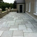 Paveworld Grey Limestone paving installed terrace showing cool grey natural tones