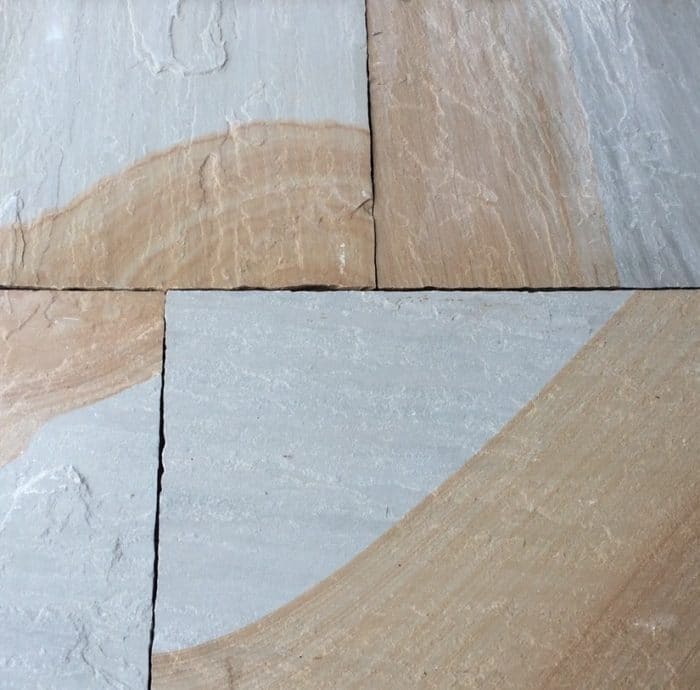 Paveworld Kandla Blend sandstone slabs showing natural riven surface and colour banding