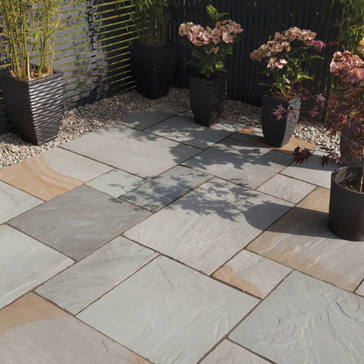 Paveworld Kandla Grey Sandstone 22mm calibrated paving laid on a patio