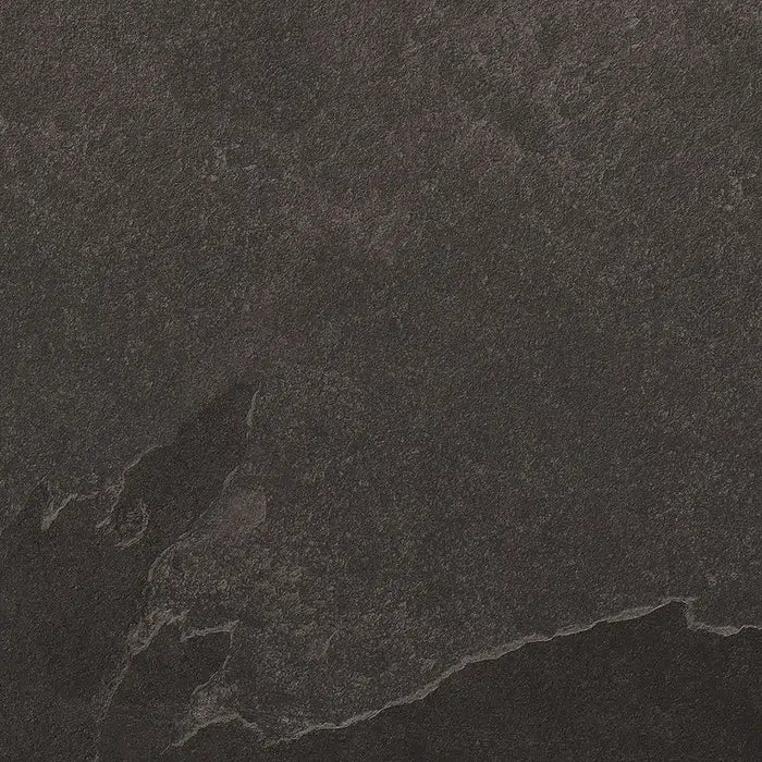 Close-up of Paveworld Lake Mustang Black vitrified porcelain paving showing the dark stone-effect surface texture