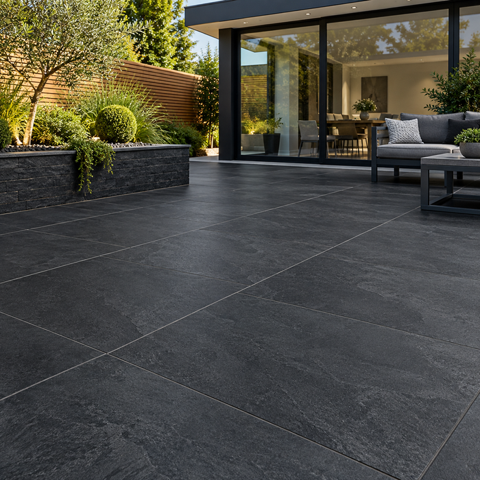 Paveworld Lake Mustang Black vitrified porcelain paving laid on a modern patio