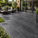 Paveworld Lake Sagar Black vitrified porcelain paving 900 x 600mm installed patio
