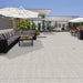 Paveworld Lake Silver Granite manufacturer image showing installed porcelain paving patio