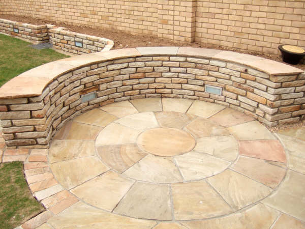 Paveworld Mint Fossil sandstone circle paving natural colour and fossil detail