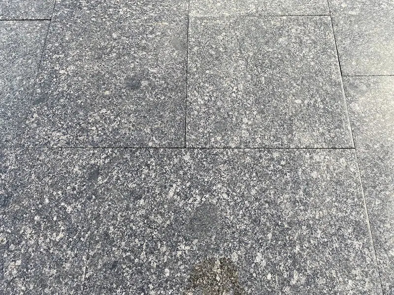 Paveworld Misty Black Pearl granite slabs showing flamed textured surface