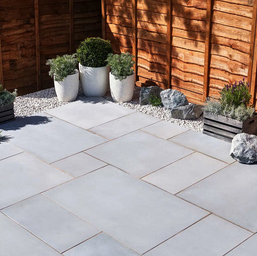 Paveworld Misty Silver Dune sandstone paving installed patio showing silver grey colour