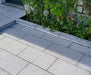 Paveworld Misty Silver Grey granite paving installed garden patio