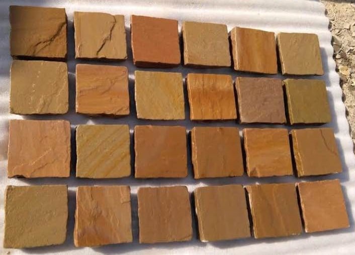 Paveworld Modak Rose sandstone cobbles setts in 150 x 150mm and 100 x 100mm sizes