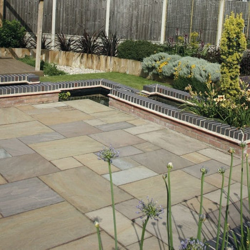Paveworld Raj Green sandstone paving installed garden patio