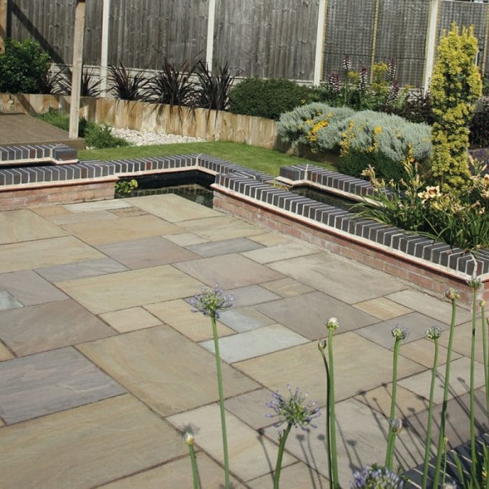 Paveworld Raj Green sandstone paving installed garden patio