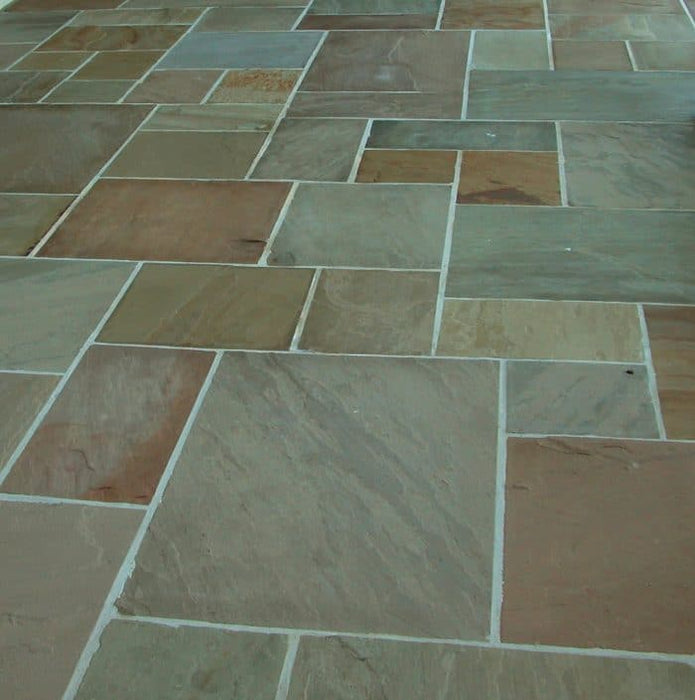 Paveworld Raj Green sandstone close-up showing riven surface and olive brown tones