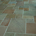 Paveworld Raj Green sandstone close-up showing riven surface and olive brown tones