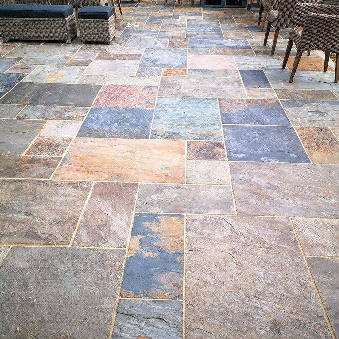 Paveworld Rustic Gold Slate paving showing bronze rust and grey natural variation