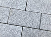 Paveworld Silver Grey flamed textured granite block setts