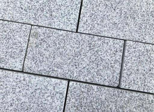 Paveworld Silver Grey flamed textured granite block setts
