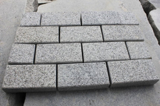 Silver Grey 200 x 100mm flamed granite driveway setts by Paveworld