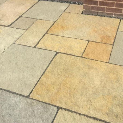 Paveworld Yellow Limestone 22mm calibrated paving showing warm honey and golden natural stone tones