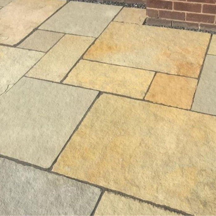 Paveworld Yellow Limestone 22mm calibrated paving showing warm honey and golden natural stone tones